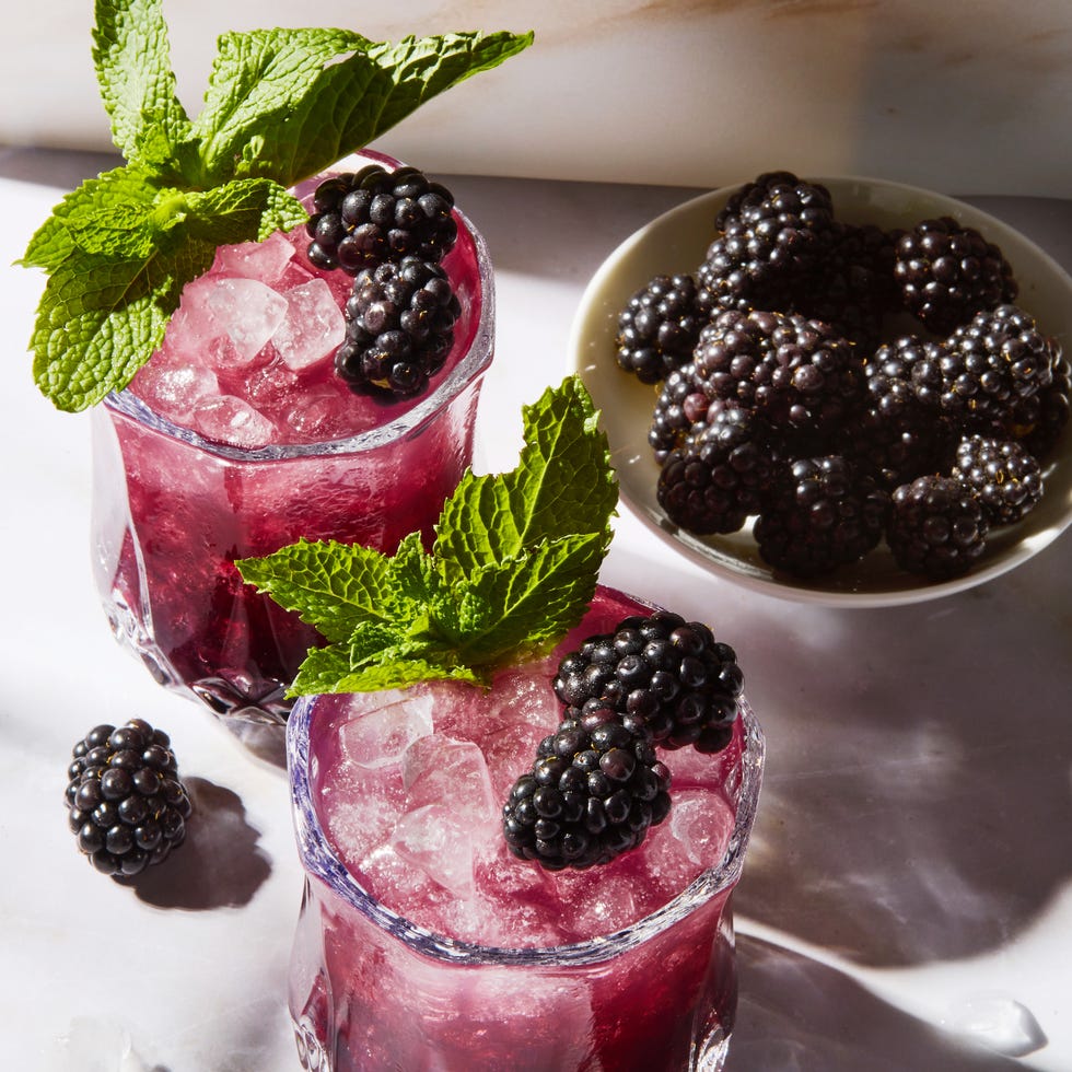 Blackberry Mint Julep purple blackberry mint julep with crushed ice garnished with a blackberry and mint sprig