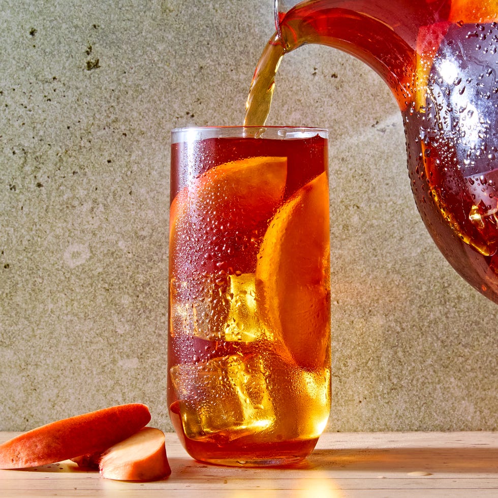 Bourbon Peach Iced Tea peach iced tea in a glass with bourbon