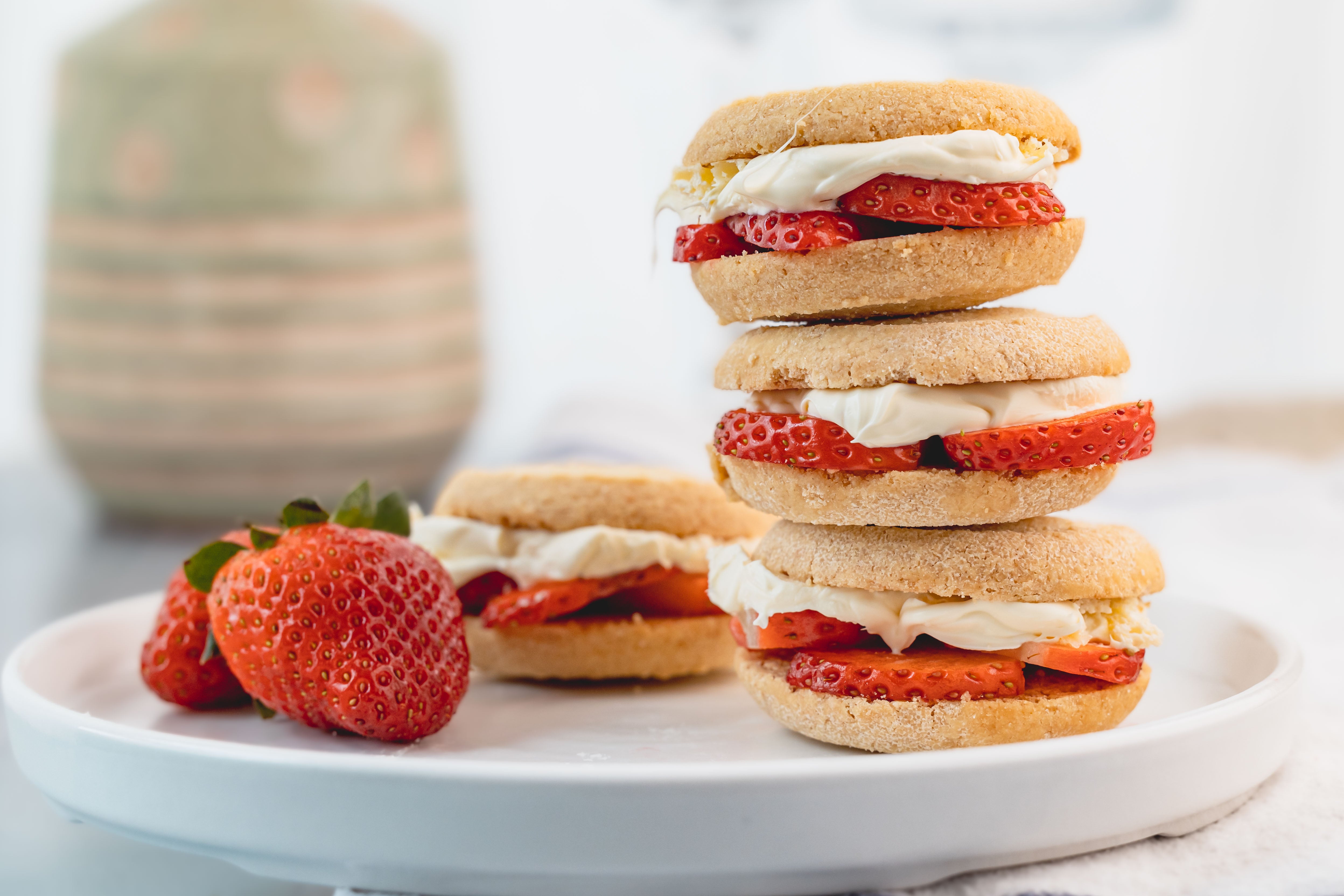 Layers of crumbly shortbread, berries and custard – a no-bake treat with extra crunch from pistachios