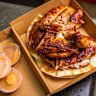 24-hour marinated charcoal chicken comes with Lebanese pita bread at Habibi Chicken’s Preston outlet.
