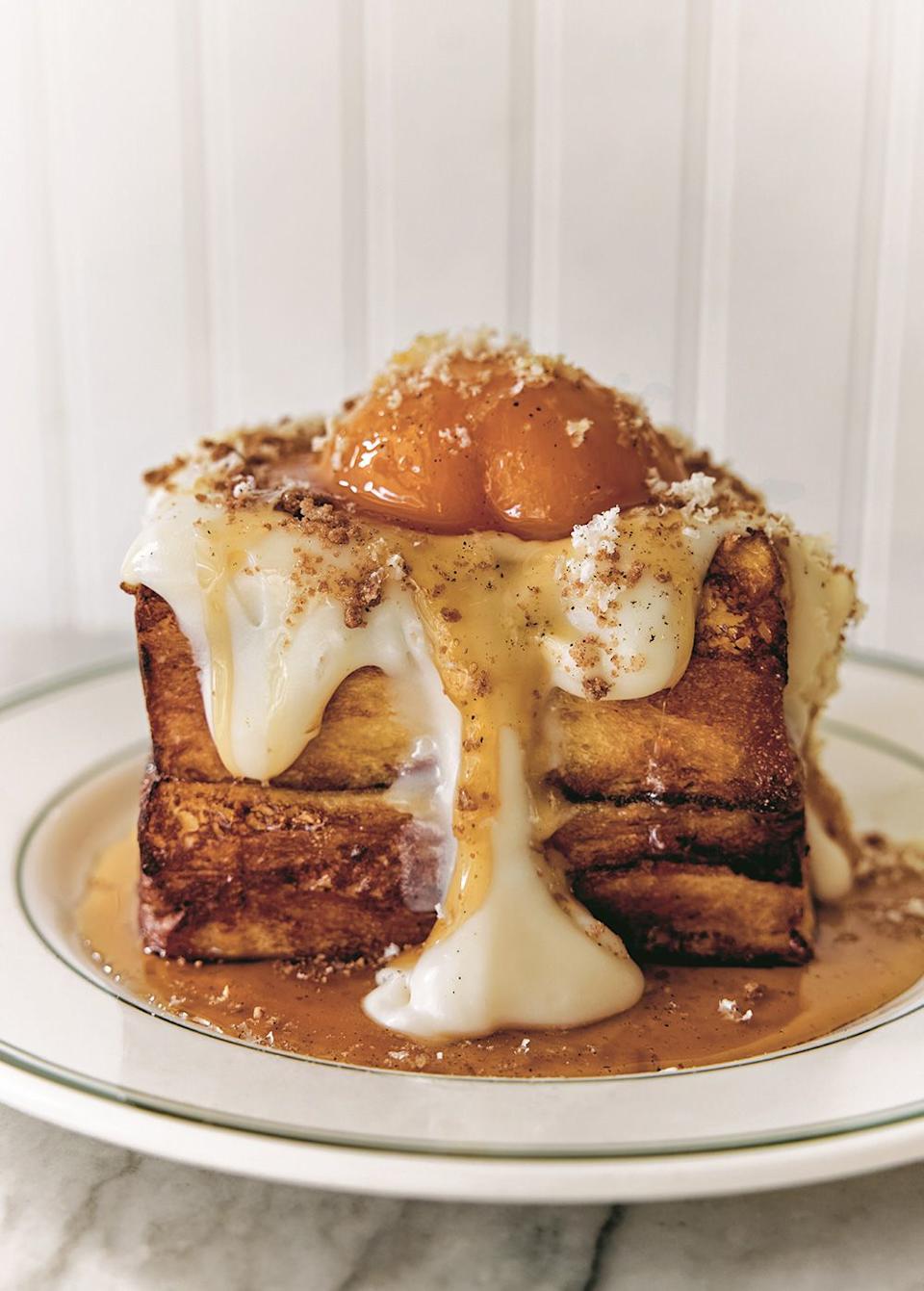 At Arthurs, they combine two techniques for their challah French toast. They start with pan-frying and finish with the soufflé way.