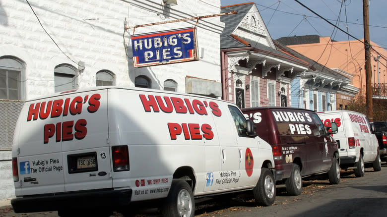The old Hubig's Pies factory with its vans parked in front of it before it burned down in 2012