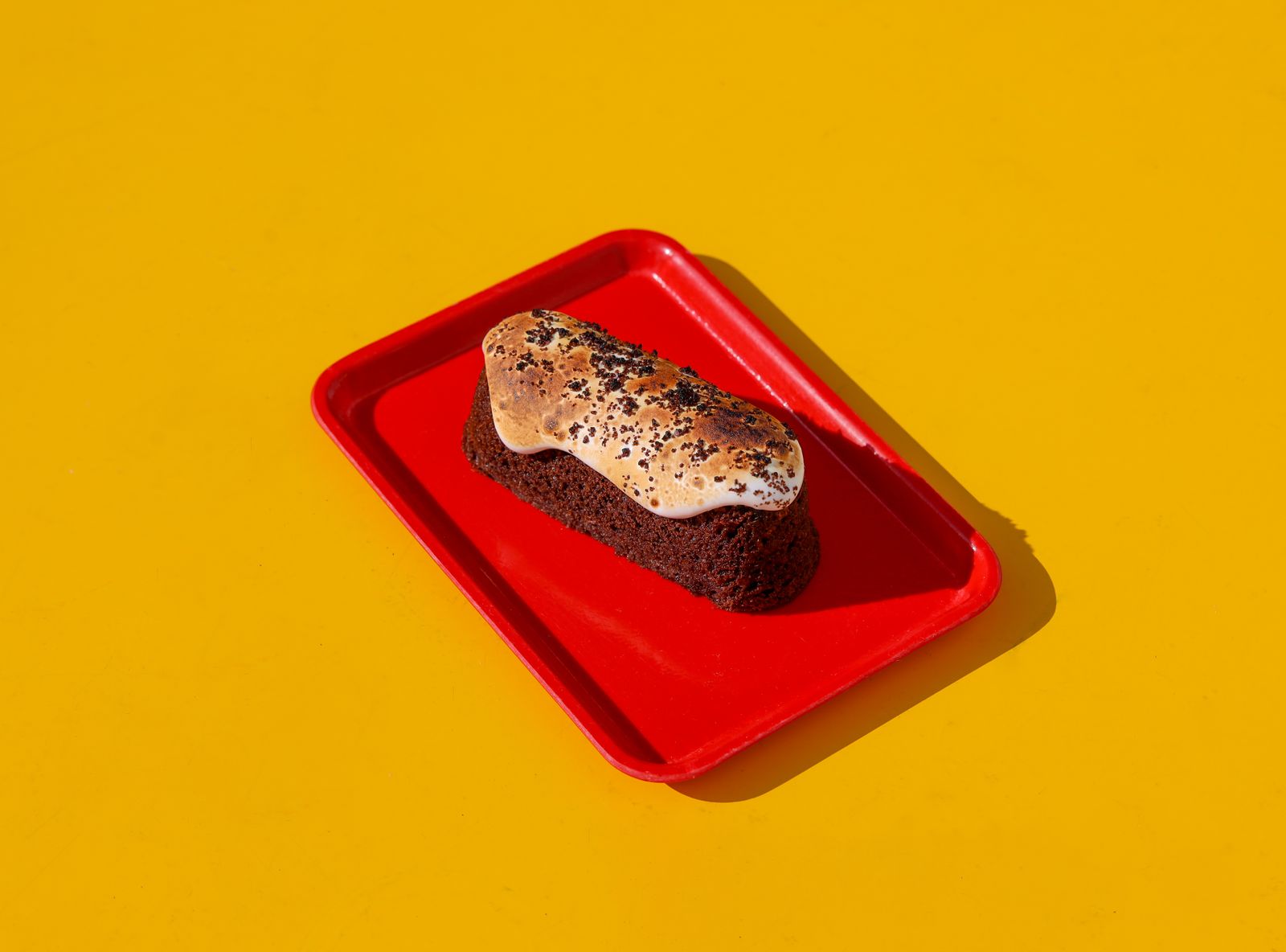 A s'mores masa twinkie on a red trey