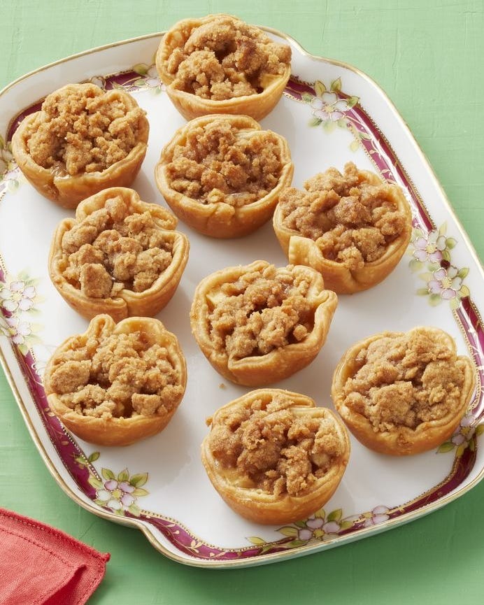 mini apple pies green background