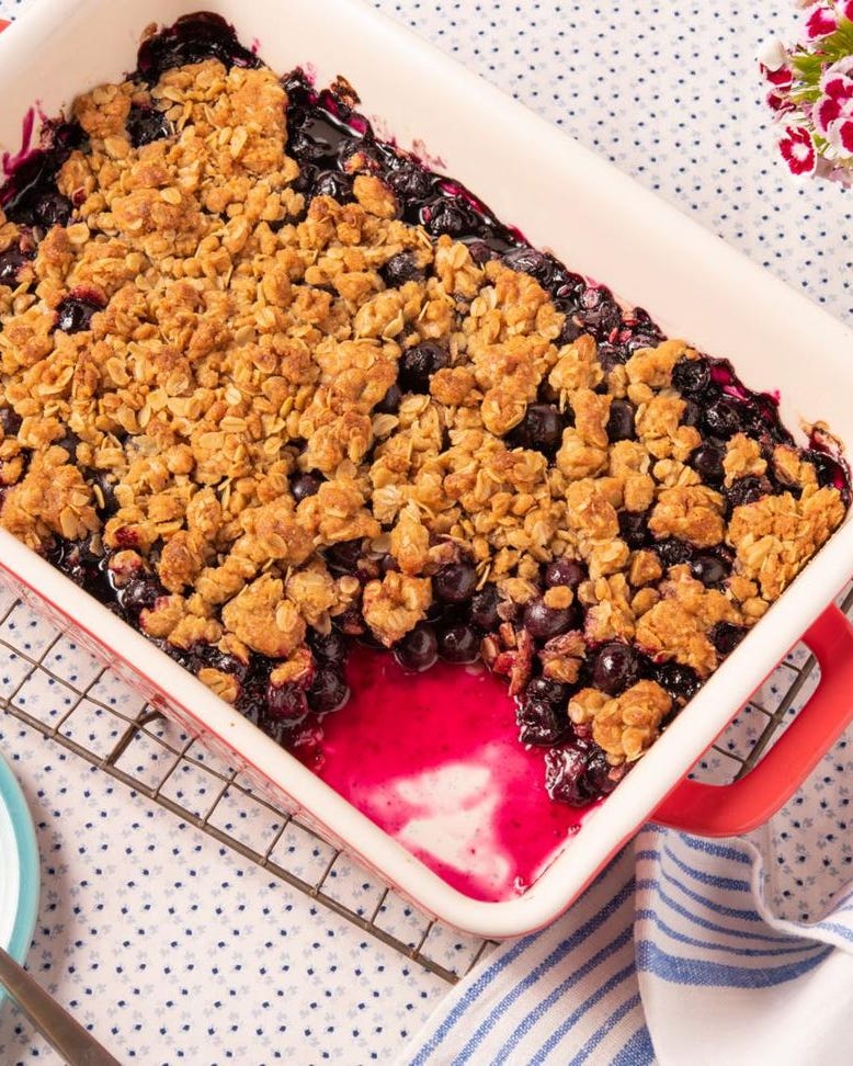 blueberry desserts blueberry crumble blueberry crumble with flowers on side