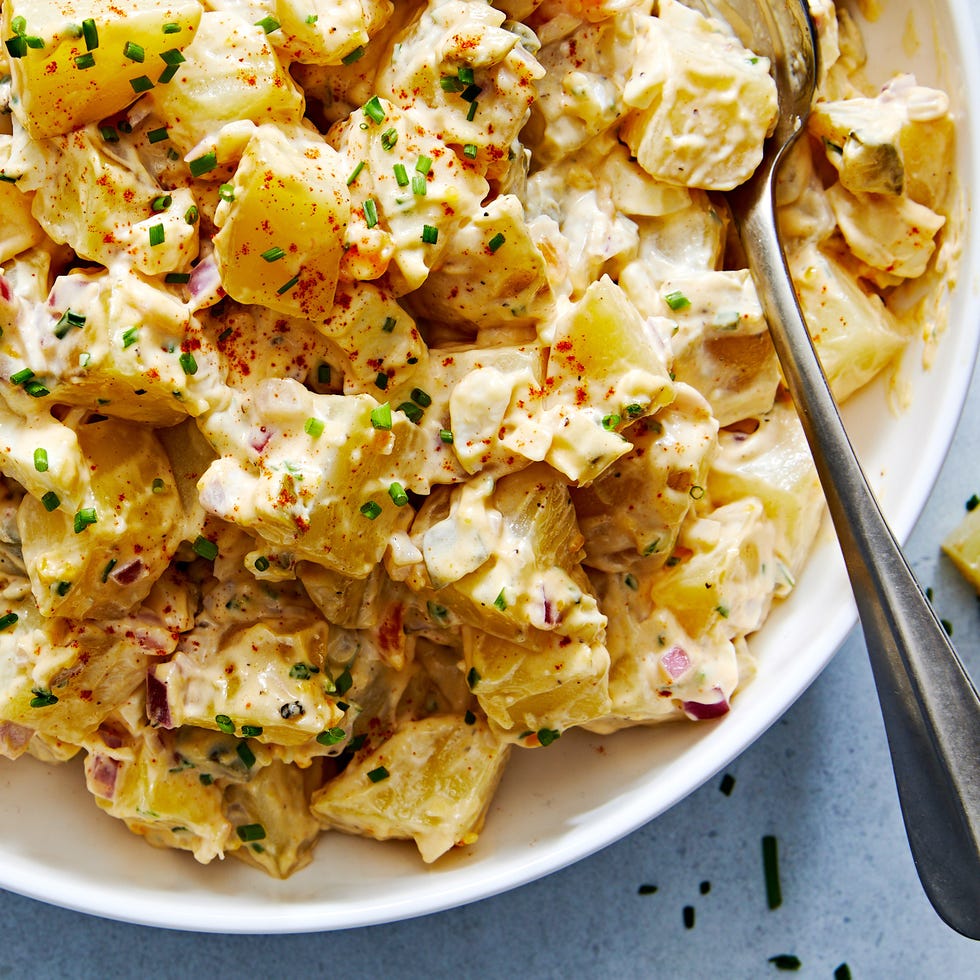 Classic Potato Salad classic potato salad with pickles, onions, and topped with paprika and chives