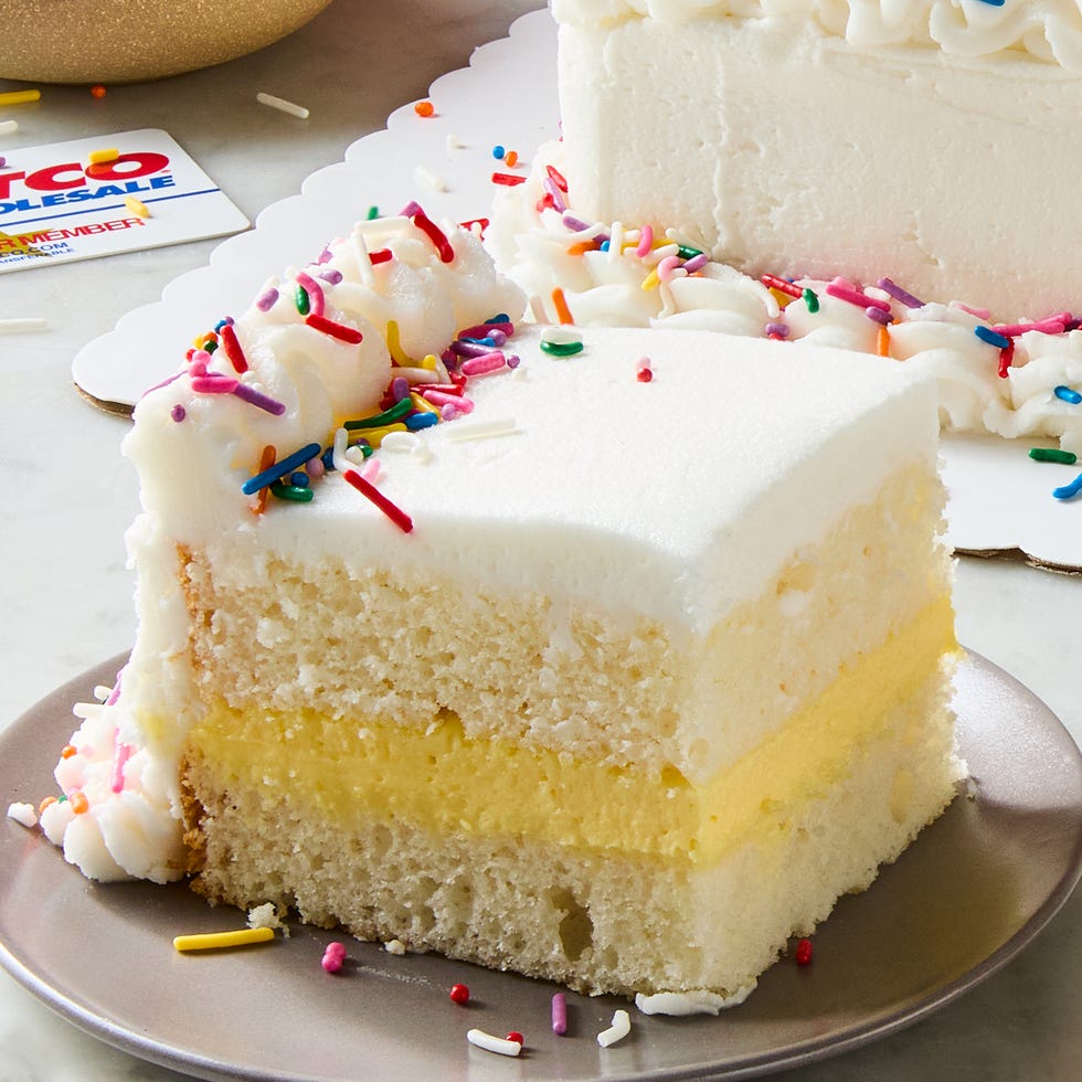 copycat costco sheet cake filled with vanilla cheesecake mousse and decorated with sprinkles
