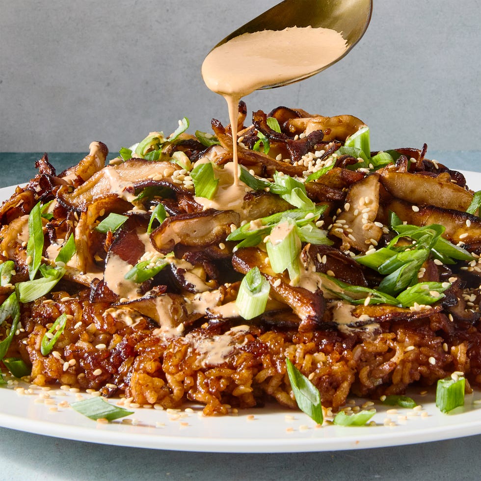 Crispy Miso Mushroom Rice Skillet red miso sushi rice cooked in butter until a deep golden brown and topped with ginger and garlic studded mushrooms, and drizzled with spicy miso mayo