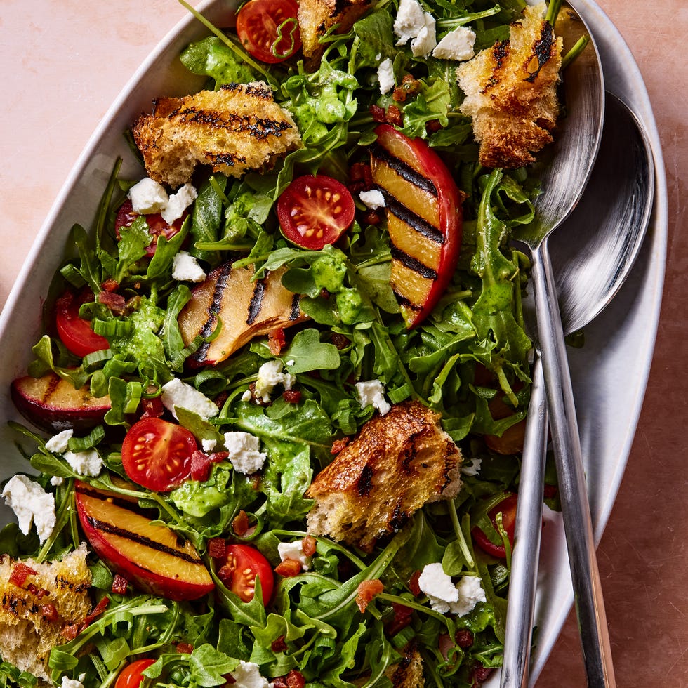 Grilled Plum & Pancetta Panzanella Salad grilled plums tossed with crispy pancetta, tangy goat cheese, fresh cherry tomatoes, and grilled sourdough bread, then drizzled with a maple dijon dressing