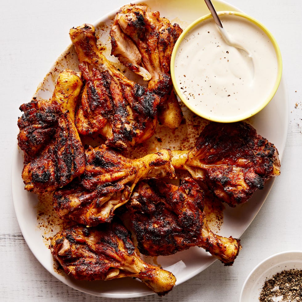 Butterflied Grilled Chicken Drumsticks butterflied chicken drumsticks seasoned with brown sugar, smoked paprika, chili powder, garlic powder, and dried thyme and grilled until tender and charred then served with alabama white sauce