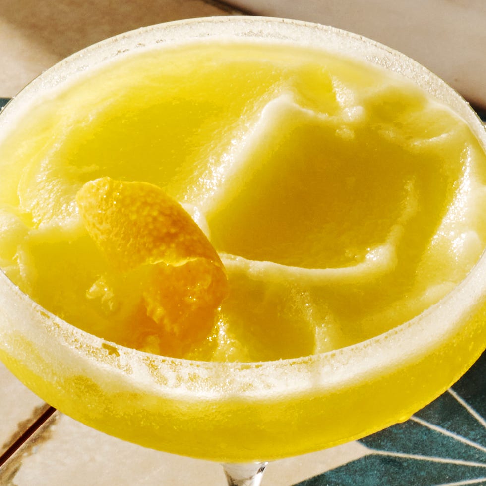 Frozen Limoncello Drop frozen limoncello cocktail with a lemon peel