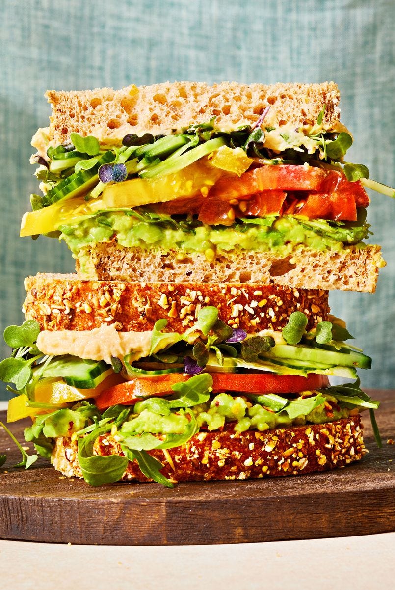 veggie packed sandwich stacked on top of each other