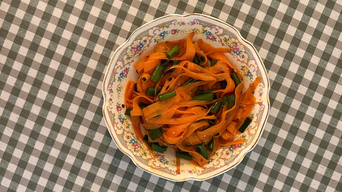 A bowl of carrot ribbon salad