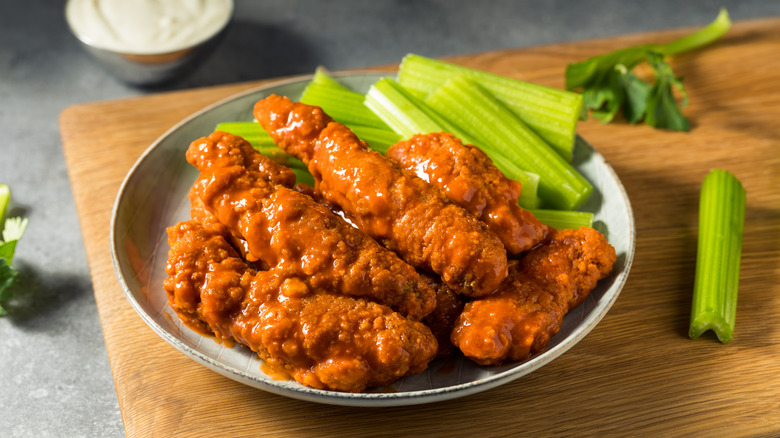 a plate of buffalo cicken tenders