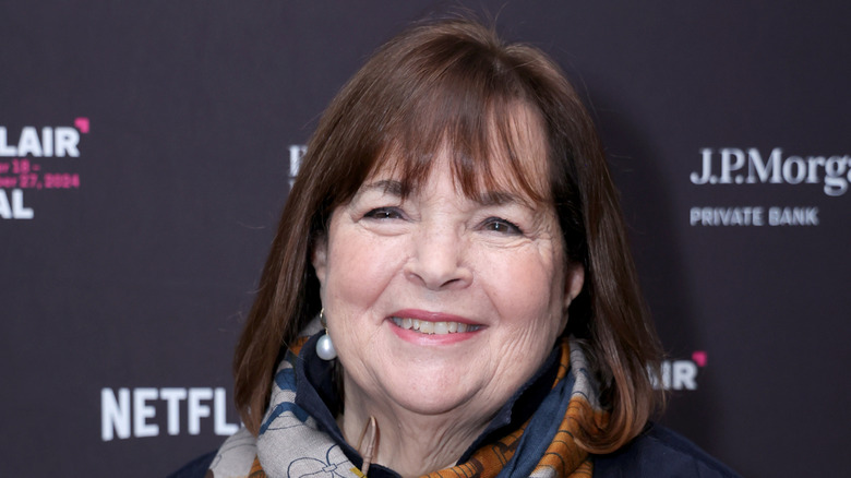 Ina Garten seated and speaking on a stage