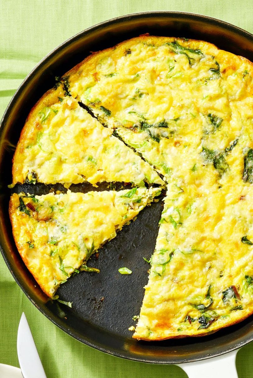 egg frittata in a pan with herbs