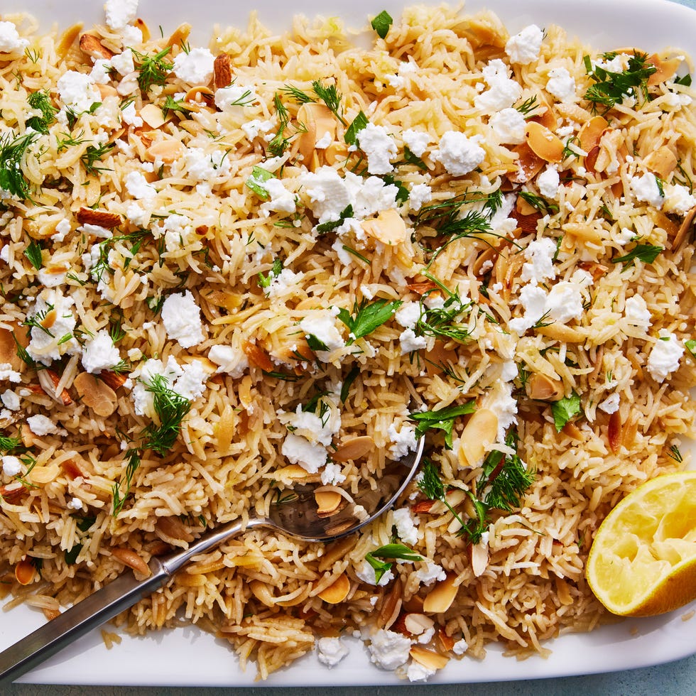 Lemon-Herb Rice Pilaf lemon herb rice pilaf topped with almonds, feta, and parsley