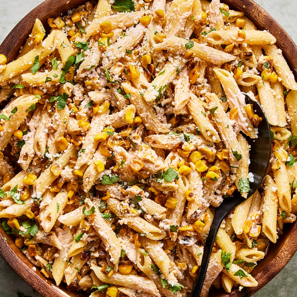 Mexican Street Corn Pasta Salad pasta salad tossed in a creamy sauce, corn, and cilantro