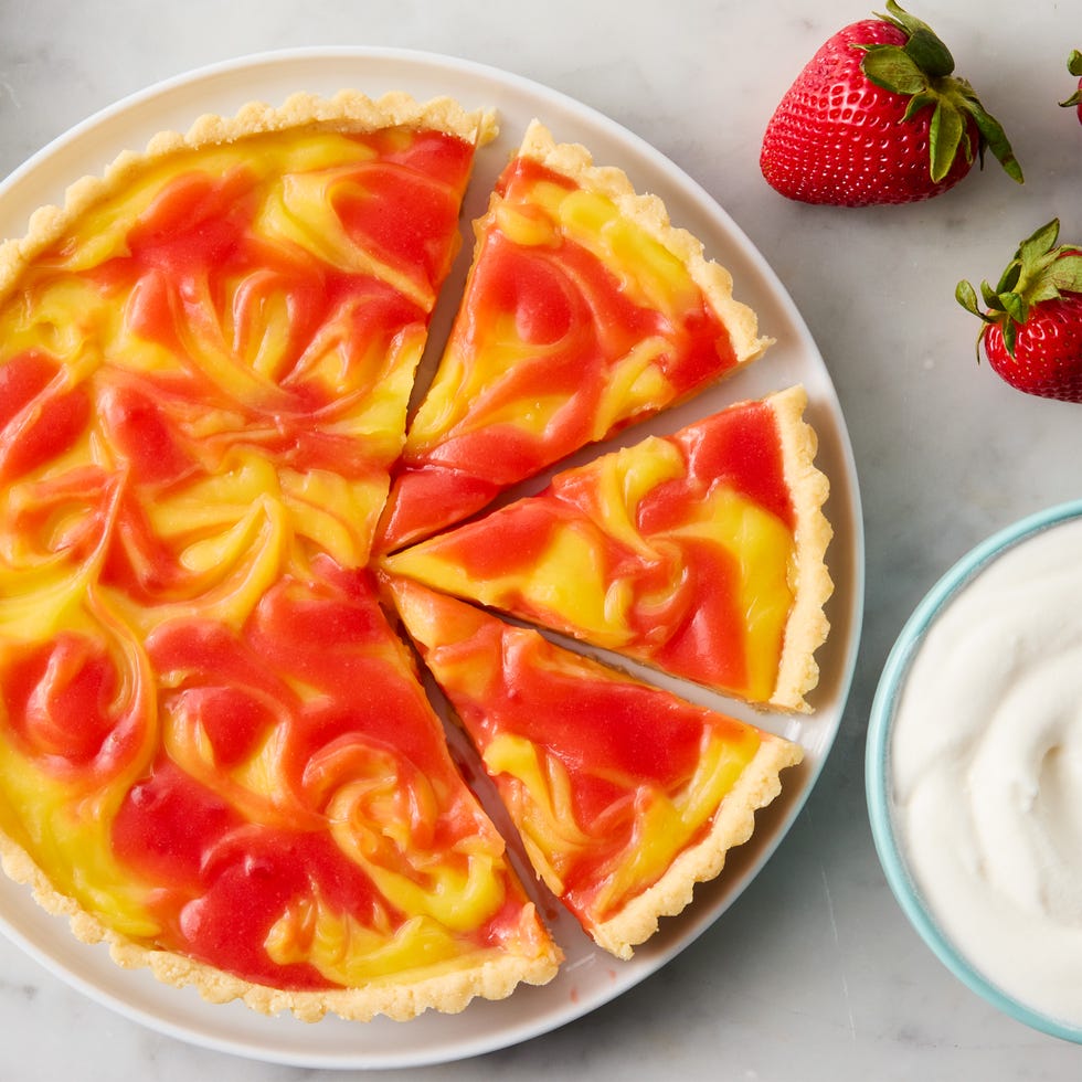 No-Bake Strawberry Lemon Swirl Tart a tart made with cookie crust and a filling of lemon and strawberry curds swirled together. served with whipped cream on the side