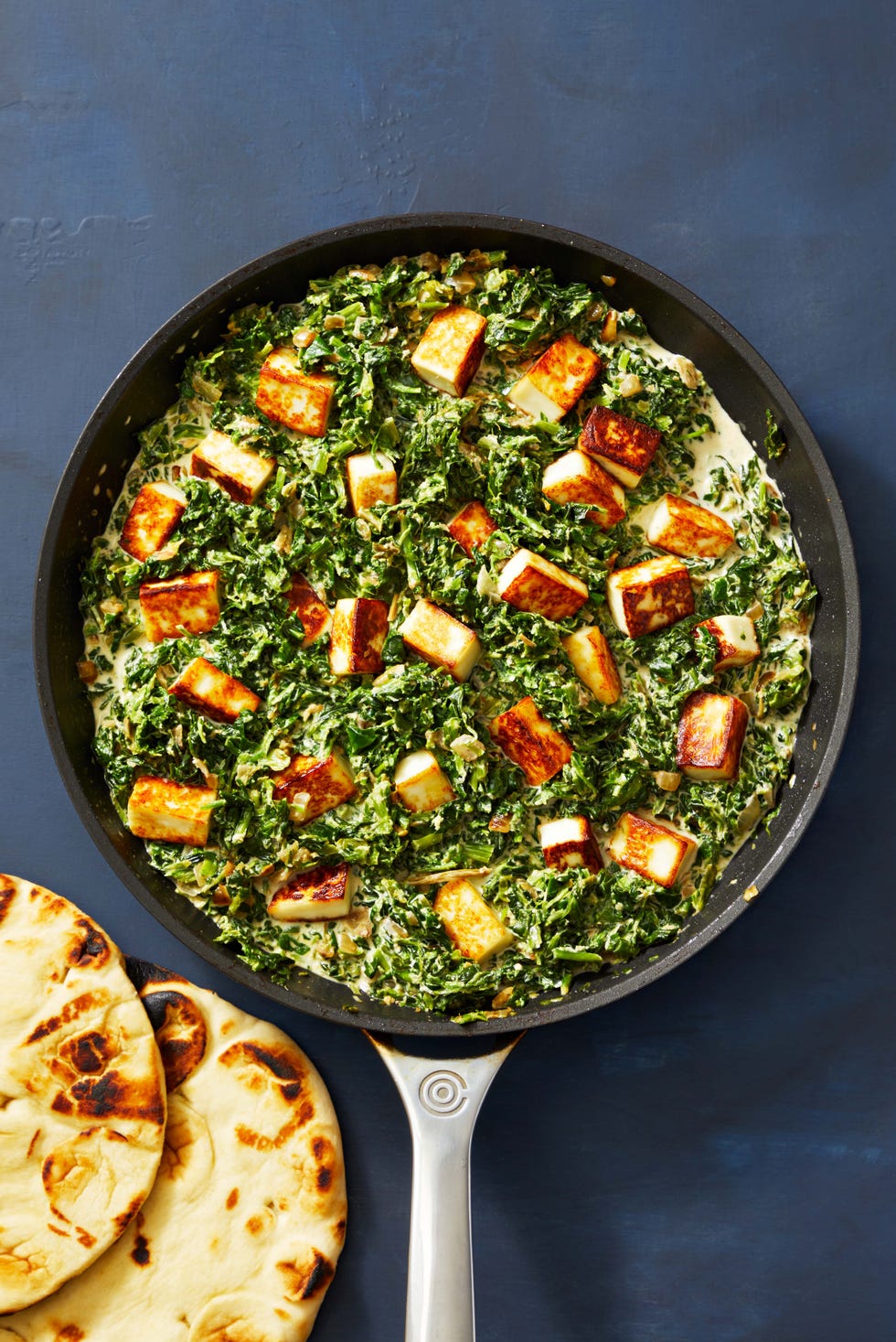 a skillet of palak paneer