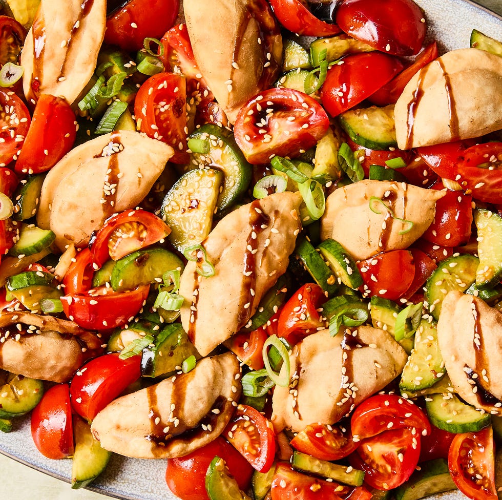 Potsticker Panzanella deep fried dumplings tossed with soy and chili marinated tomatoes and cucumbers