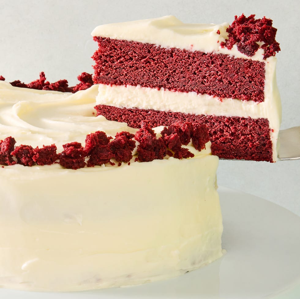 Red Velvet Cake layered red velvet cake with cream cheese icing and pieces of cake