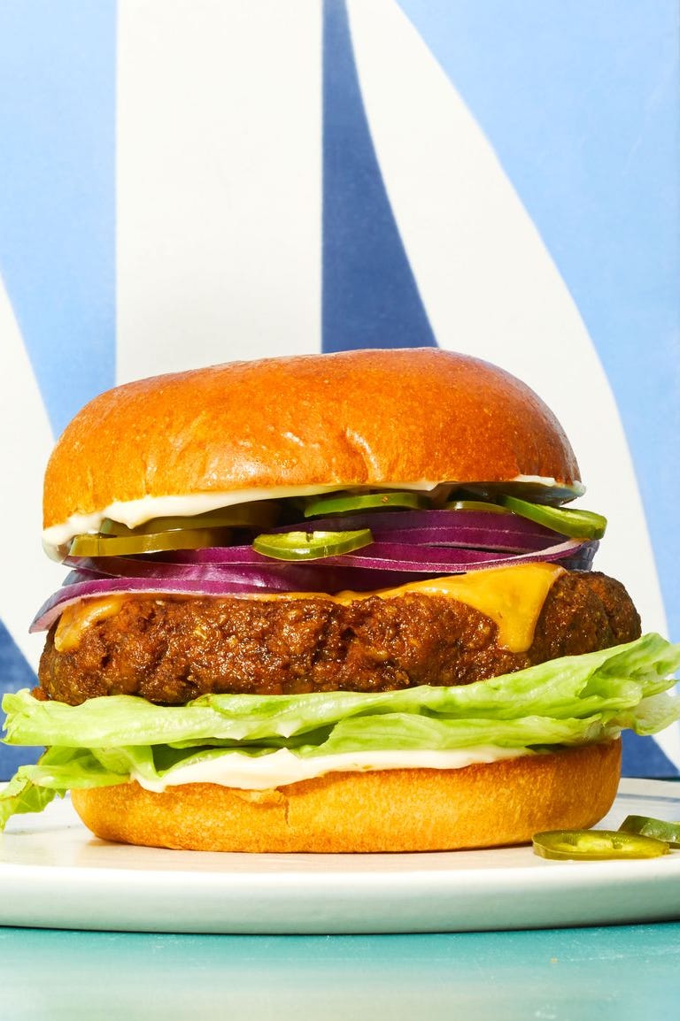roasted eggplant veggie burgers with red onion, cheese, pickles and lettuce