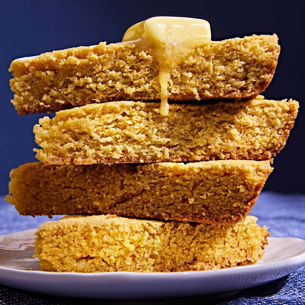 stack of cornbread topped with a pat of butter stack of cornbread topped with a pat of butter