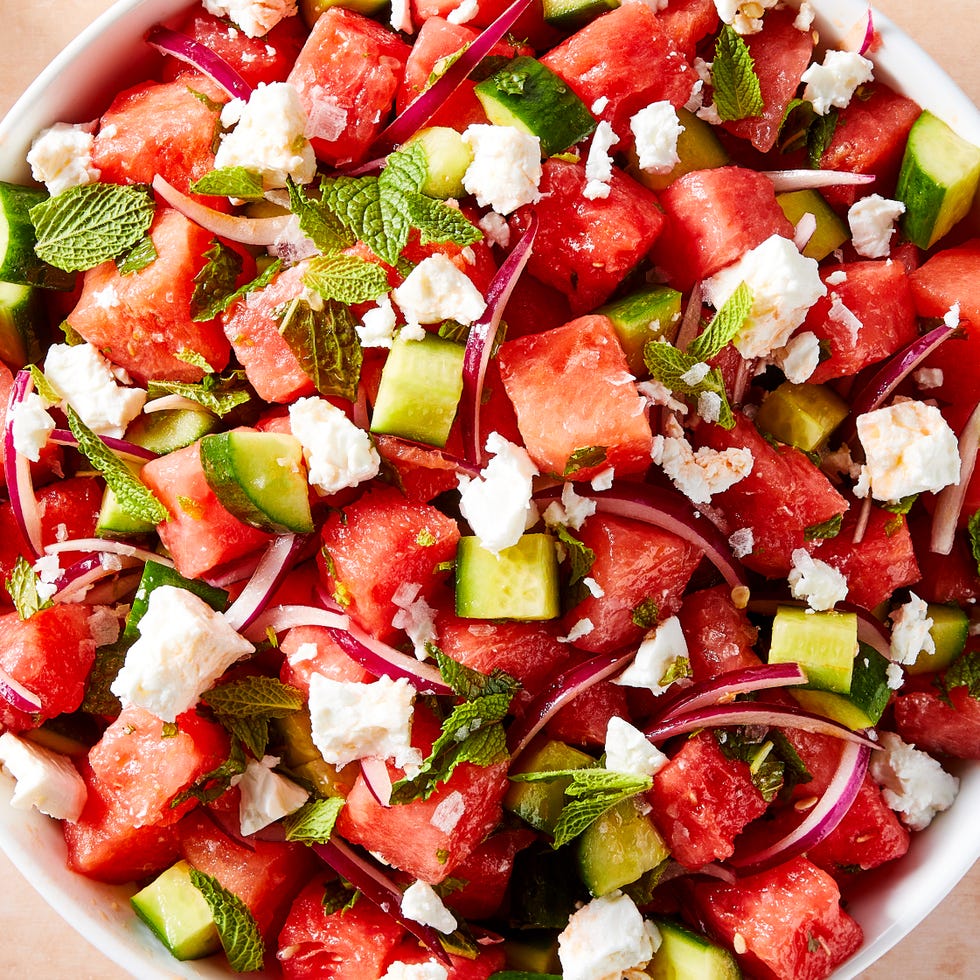 Watermelon Feta Salad watermelon cubes, feta, red onion, and mint in a bowl
