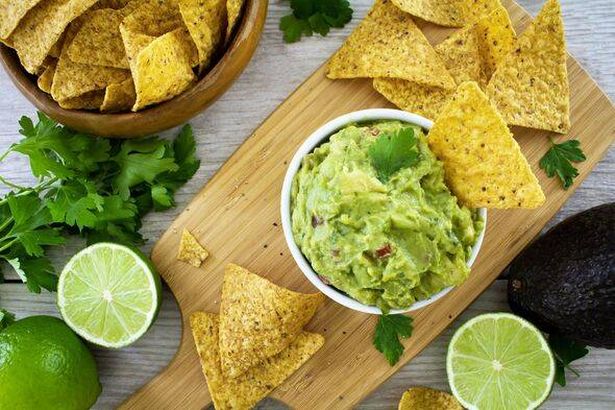 Guacamole and chips, shot from above.
