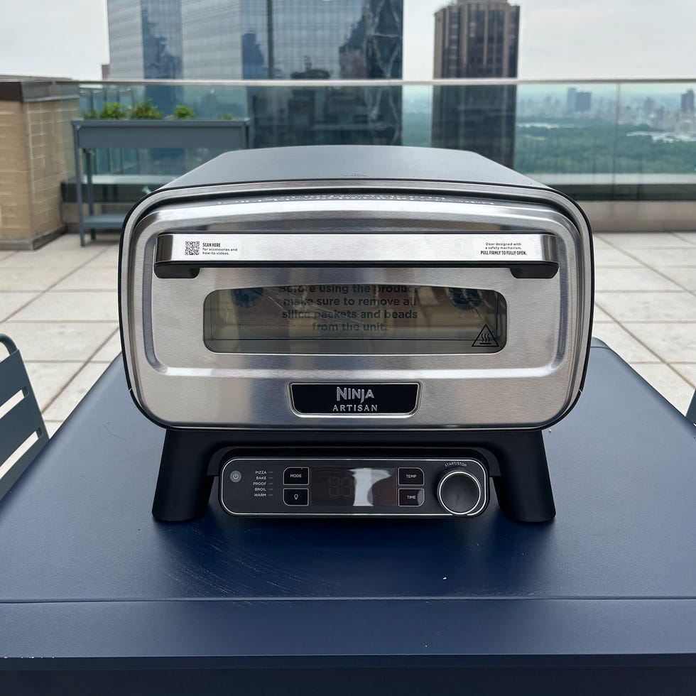 electric countertop oven with digital controls and transparent window