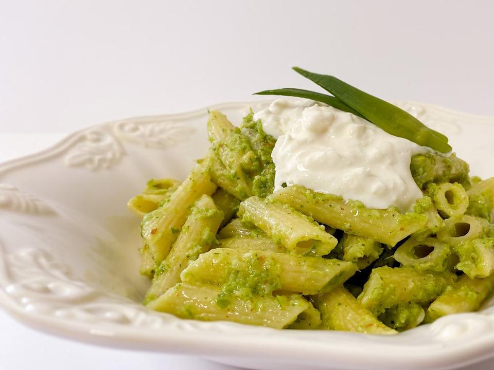 Pasta with garlic scape pesto and burrata cheese as created by Karen Gordon.