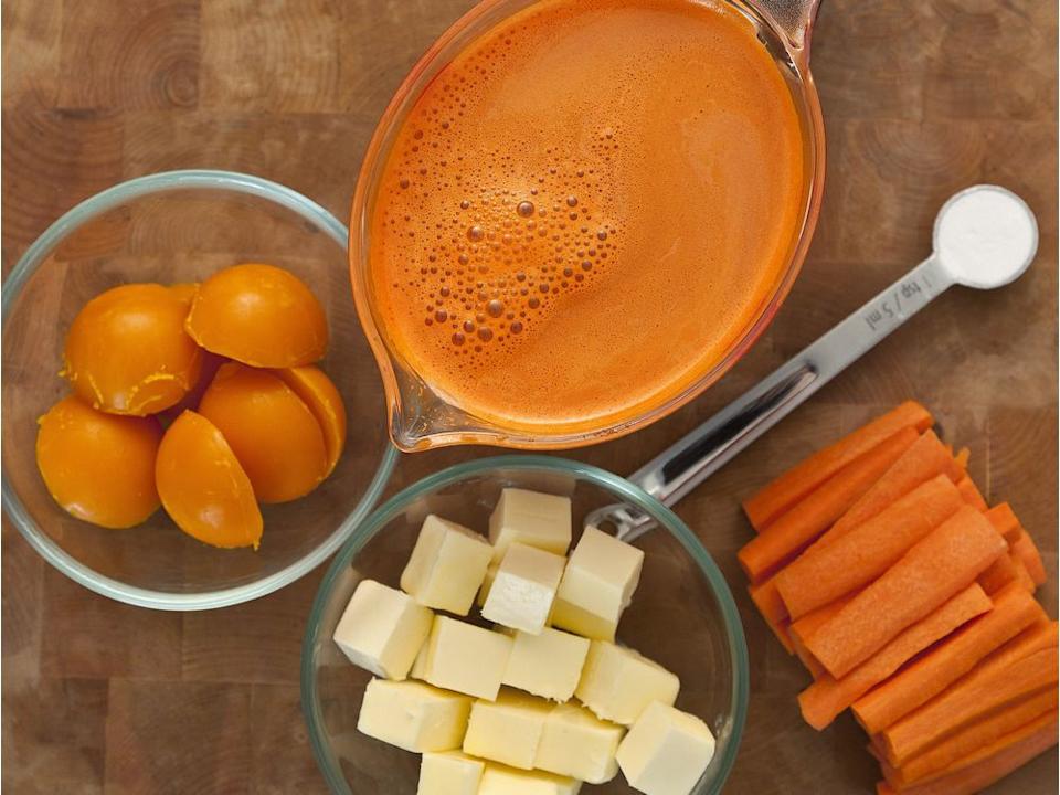 The carrots are pressure-cooked, puréed and pressed through a sieve, giving the soup a velvety texture.