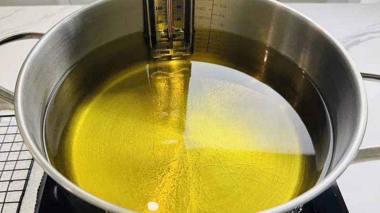 heating oil in large pot