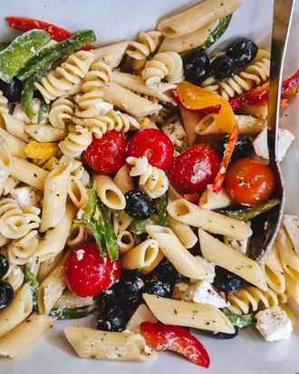 Pasta salad with cherry tomatoes and olives, ready to eat