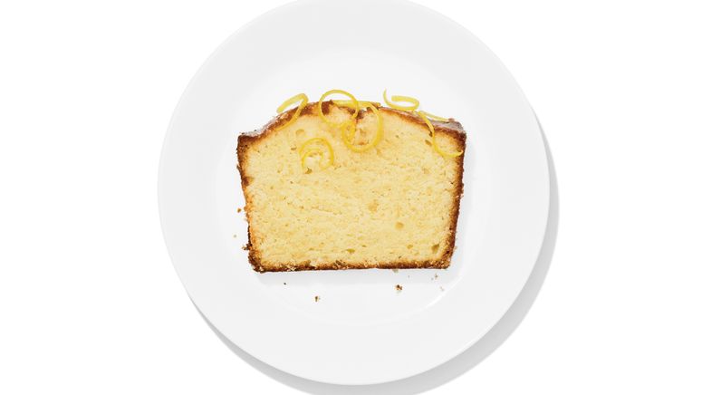 A slice of lemon pound cake on a plate.