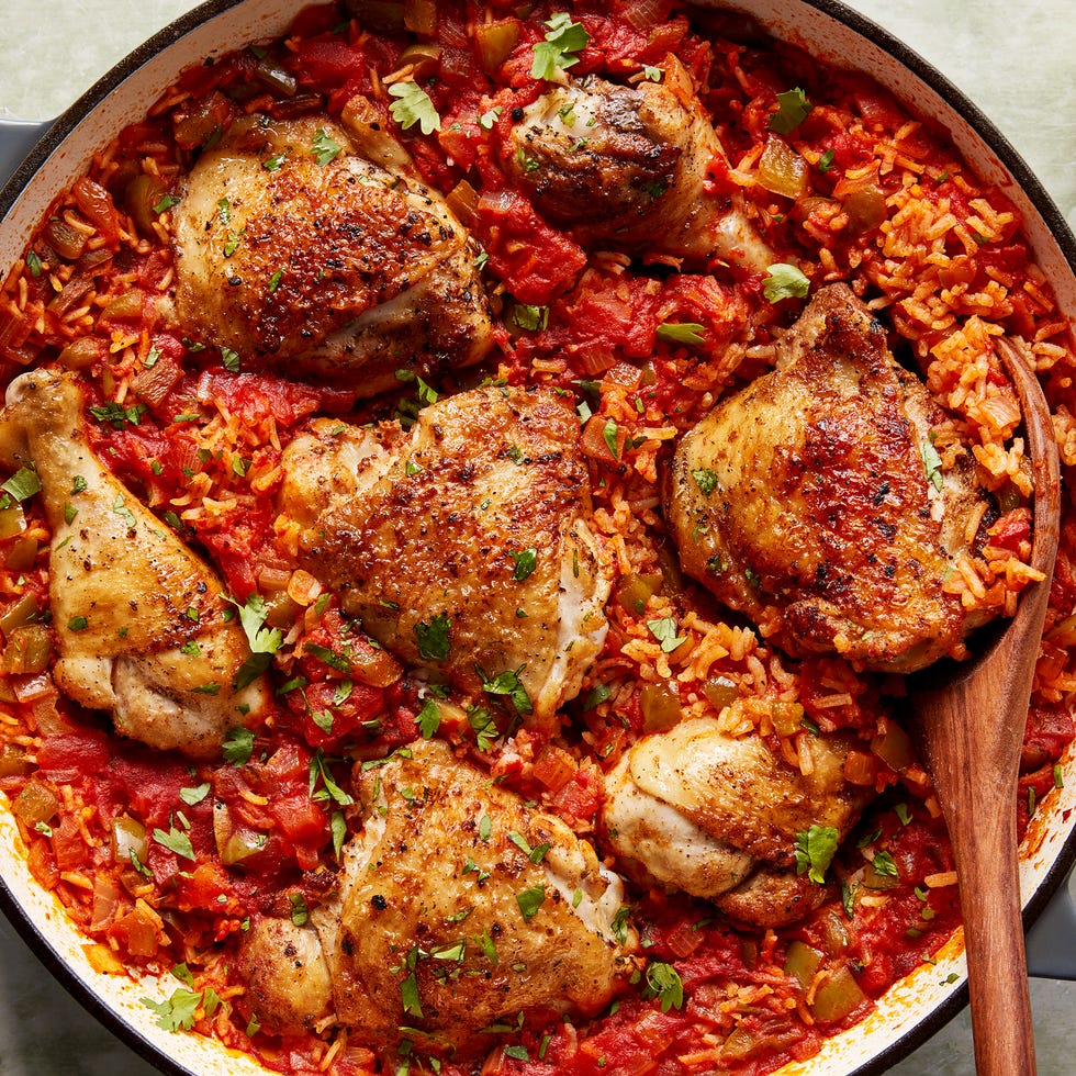 Arroz Con Pollo chicken thighs and legs in a tomato based rice