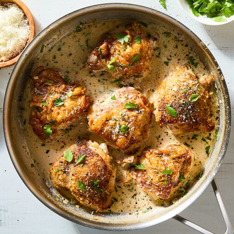 Cacio e Pepe Chicken cacio e pepe chicken thighs with lemon wedges