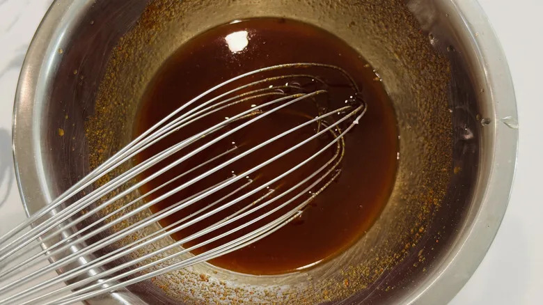 whisking glaze in bowl