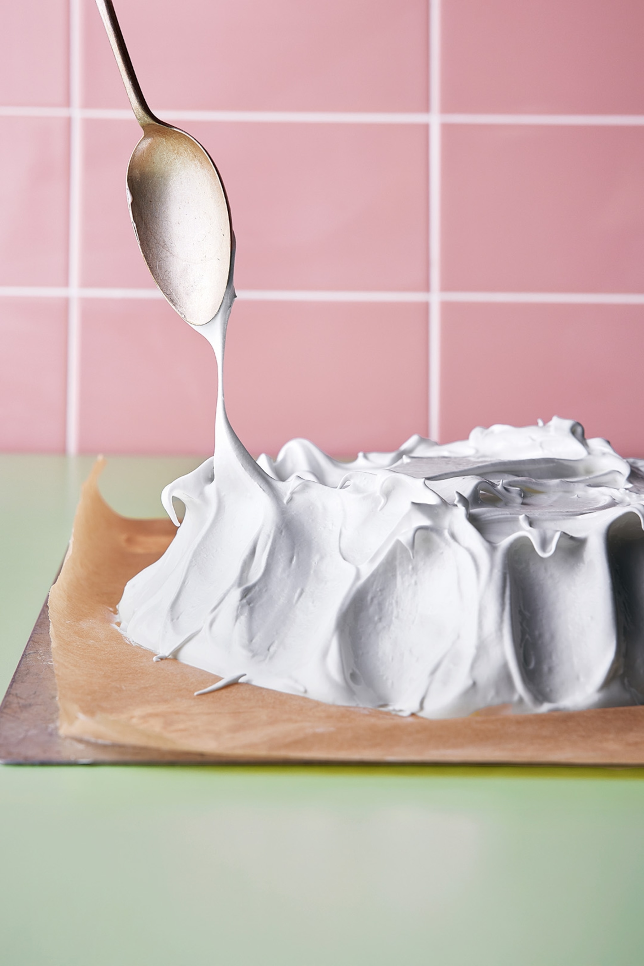 shot of the meringue being scooped onto tray