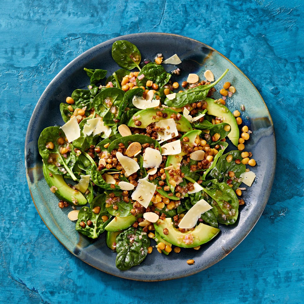 spinach salad with crispy lentils and aged gouda