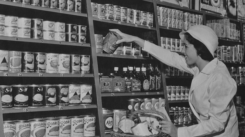 Vintage photo of woman in 1930s grocery store