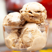 a close up of No Churn Pumpkin Pie Ice Cream in a glass dish