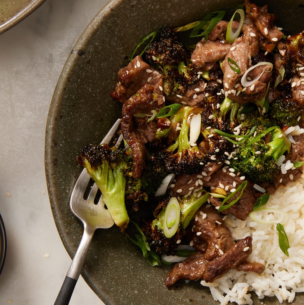 air fryer beef and broccoli in a bowl with white rice