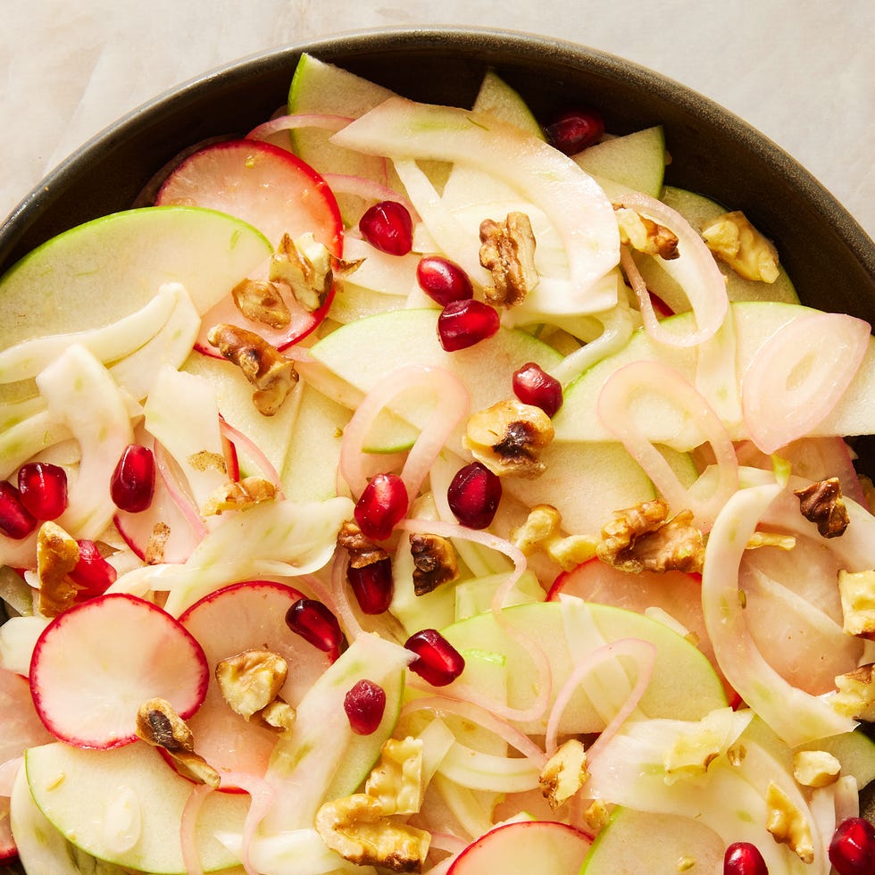 Fennel Salad With Apples And Radishes fresh fennel salad with apples, radishes, shallots, pomegranate seeds, and walnuts