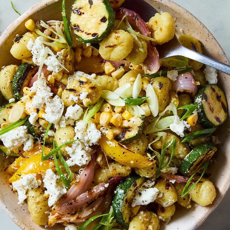 grilled gnocchi, zucchini, corn and onion salad