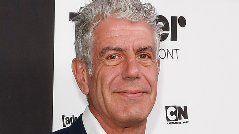Anthony Bourdain smiling at event
