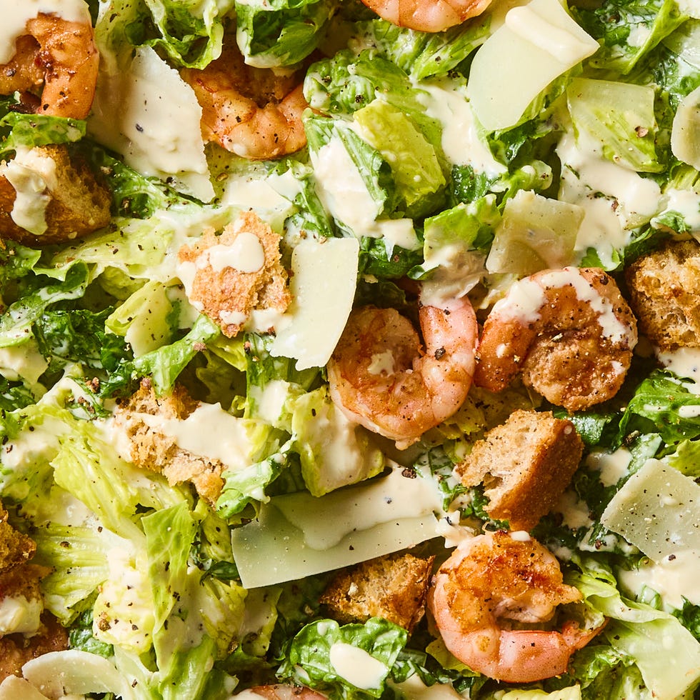 Shrimp Caesar Salad horseradish marinated seared shrimp, crisp romaine, salty shaved parm, and crunchy homemade sourdough croutons tossed in a creamy, cheesy umami packed dressing