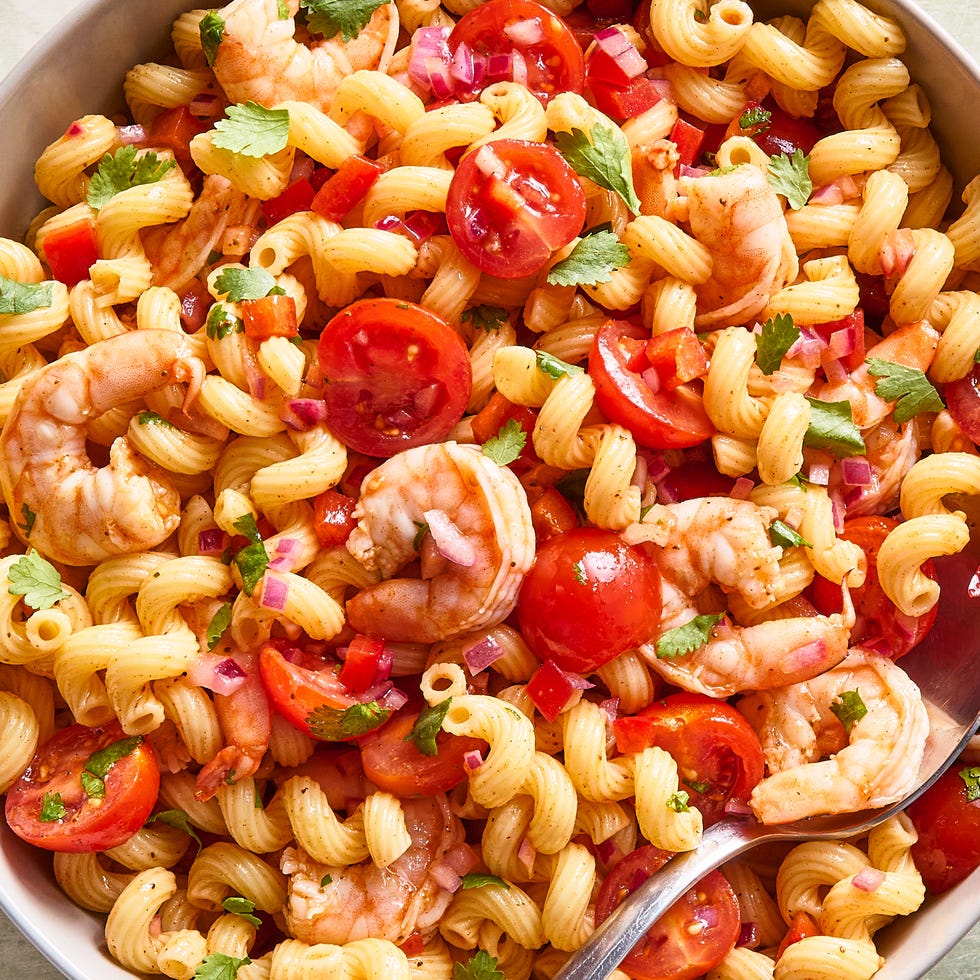 Shrimp Pasta Salad shrimp pasta salad with chopped tomatoes and red onion