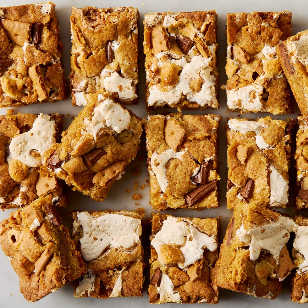 cookie bars filled with s'mores ingredients like chocolate, marshmallow, and graham crackers